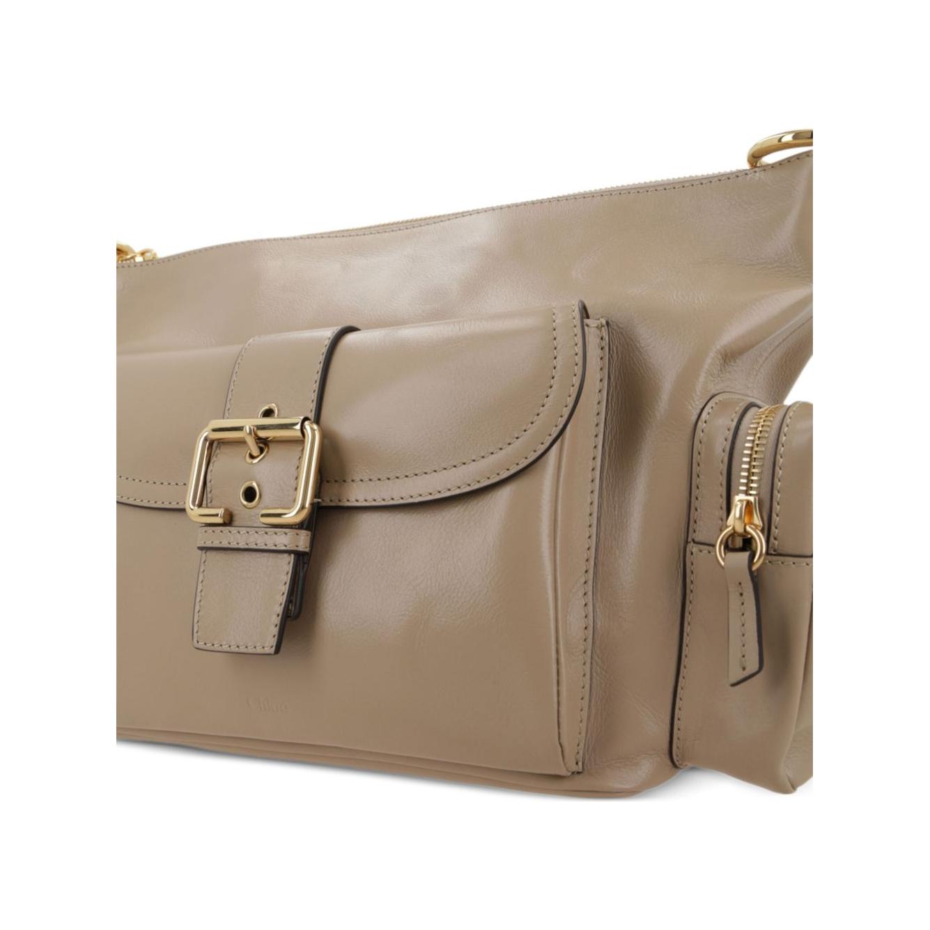 Front view with bag zipped and handles upright.