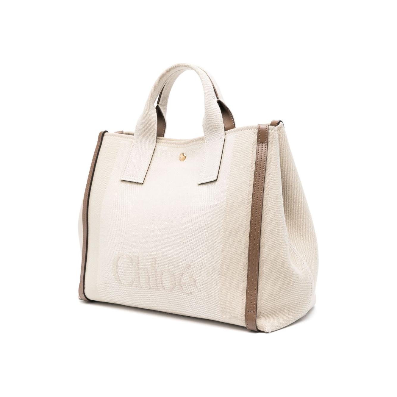 Front view with bag zipped and handles upright.
