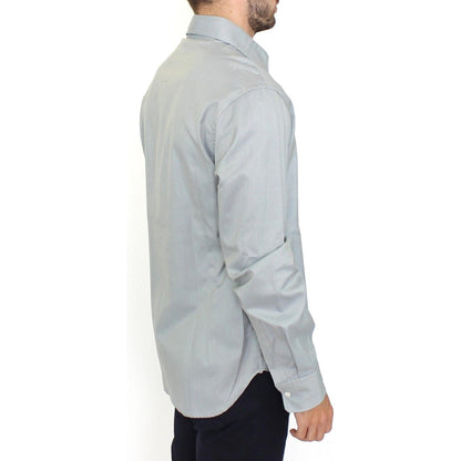 Side view of a man wearing a gray cotton casual shirt, stylish button front design, perfect for casual occasions.