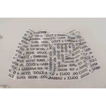 Dolce & Gabbana White Logo See Through A-line Mini Skirt 1728,67345645728,Clothing,Dolce & Gabbana,IT40|S,Material: 100% Polyester,Mini - Skirts - Clothing,New with tags,Skirts - Clothing,Skirts - Women - Clothing,White,Women,Women - Clothing