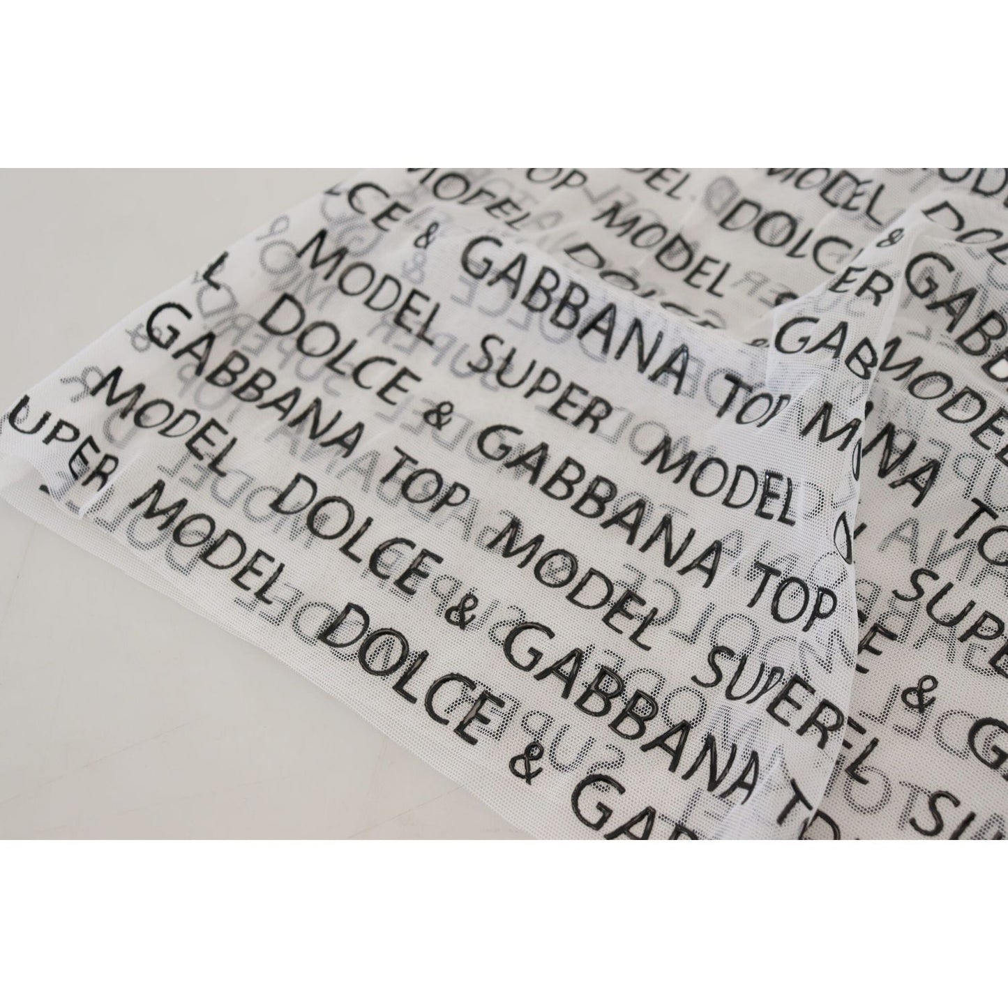 Dolce & Gabbana White Logo See Through A-line Mini Skirt 1728,67345645728,Clothing,Dolce & Gabbana,IT40|S,Material: 100% Polyester,Mini - Skirts - Clothing,New with tags,Skirts - Clothing,Skirts - Women - Clothing,White,Women,Women - Clothing